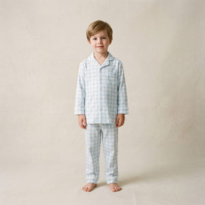Child wearing the Count & Countess Baby Blue Gingham Pima PJ set