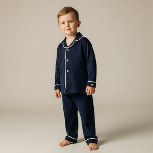 Child wearing the Count & Countess Urban Navy Pima pyjama set