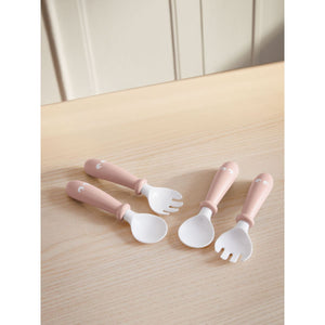BabyBjörn Baby Spoon and Fork, 4 pcs, Powder Pink on a table