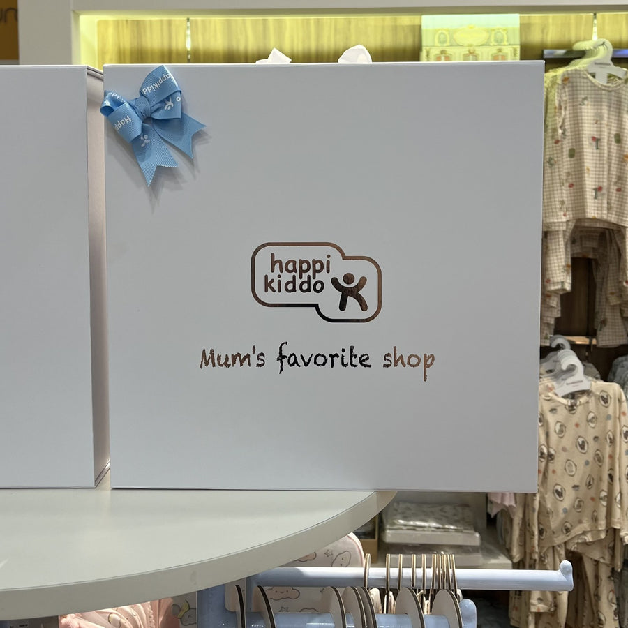 Happikiddo gift box with blue ribbon on display in store