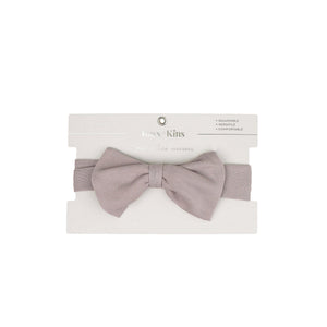 Baby wearing the Kays+Kins Sphinx print pre-tied bow headband