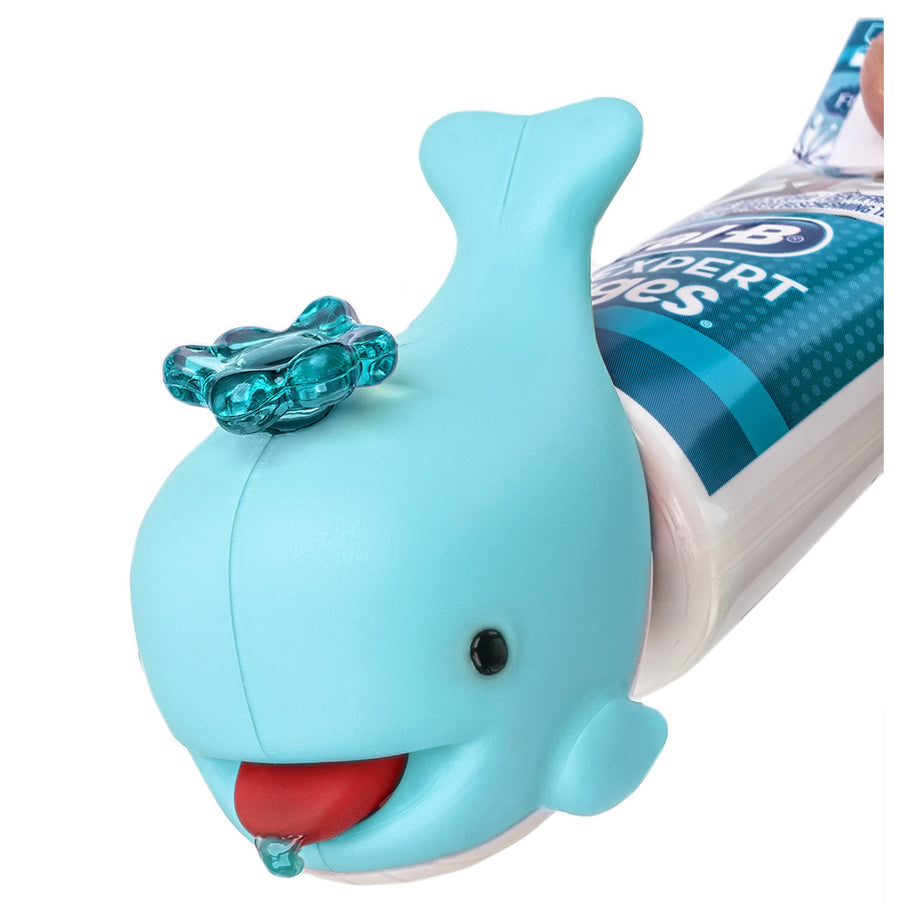Flipper Whale Blue toothpaste squirter fitted to a toothpaste tube