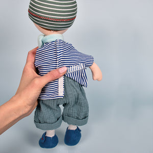 Jolijou Les Canailles rag doll Tim held in a hand for scale