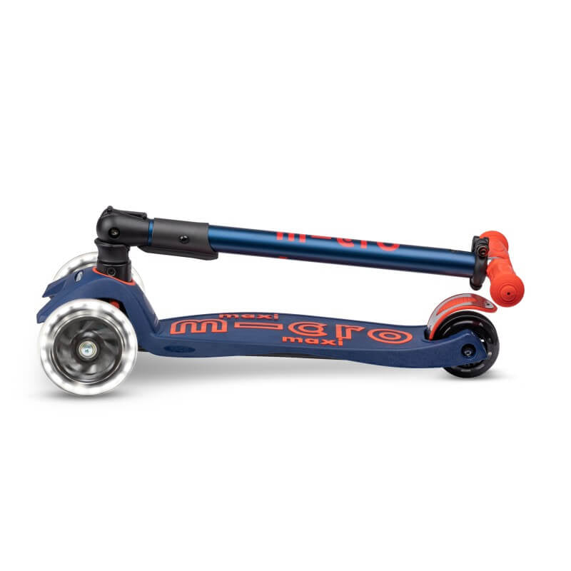 Micro Maxi Deluxe Foldable LED scooter in Navy Red, shown folded