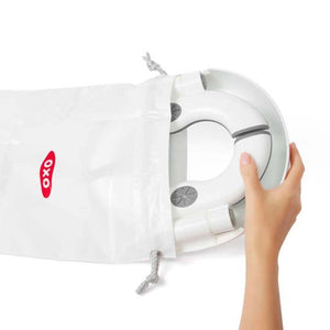 OXO Tot Go Potty folded into its travel bag