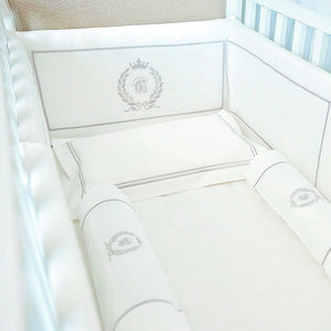 Platinum White Egyptian cotton pillow and bolsters styled in a cot