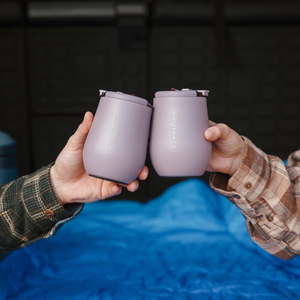 Two BruMate Uncork'd XL tumblers raised in a toast