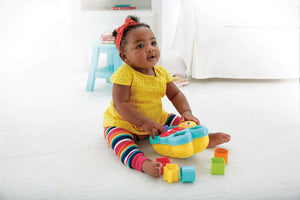 Baby sorting shapes into the Fisher-Price Butterfly Shape Sorter