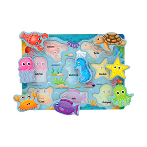 Under the Sea puzzle with pieces lifted showing the named sea creatures underneath