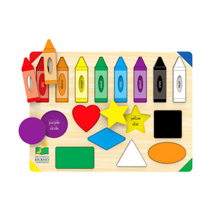 Colors & Shapes puzzle with crayon and shape pieces lifted showing the names printed underneath